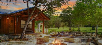 Charming Creekside Cabin w/ Hot Tub, Fire Pit & Natural Rock Waterfalls