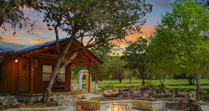 Charming Creekside Cabin w/ Hot Tub, Fire Pit & Natural Rock Waterfalls