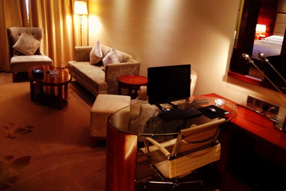 In-room safe, desk, blackout curtains, iron/ironing board (on request)