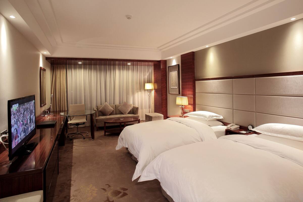 In-room safe, desk, blackout curtains, iron/ironing board (on request)