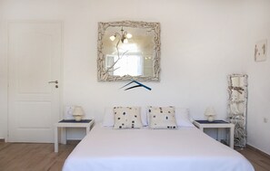 2 habitaciones, tabla de planchar con plancha, wifi y ropa de cama