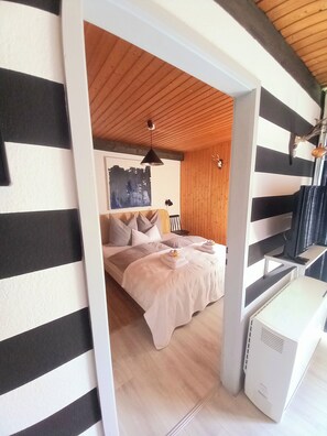 2 bedrooms, in-room safe, iron/ironing board, travel cot