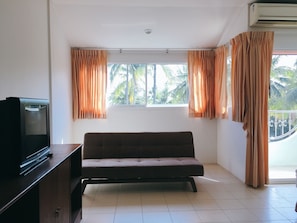 Superior Room, 1 Double Bed | Living area | TV