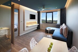 Suite, 1 Bedroom | Living area | Flat-screen TV - OZO Phuket (Karon)