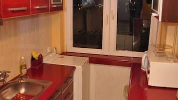 Apartment, Sea View | Private kitchen | Fridge, microwave, oven, stovetop