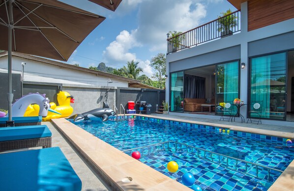 Outdoor pool, open 9:00 AM to 10:30 PM, pool umbrellas, pool loungers