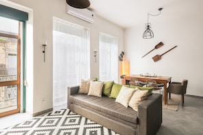 Family Apartment, 1 Bedroom, Balcony, River View | Living room