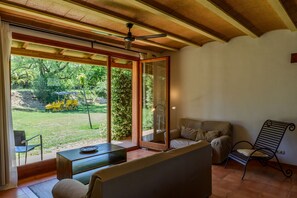 TV, fireplace - Charming country cottage in quiet village inland Costa Brava. Pool, barbecue (LLADO)