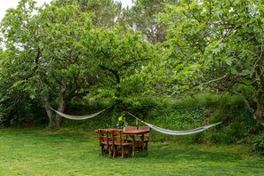 Outdoor dining - Charming country cottage in quiet village inland Costa Brava. Pool, barbecue (LLADO)