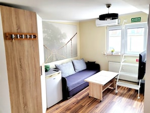 Apartamento | Espaço de trabalho para notebook, ferros/tábuas de passar roupa