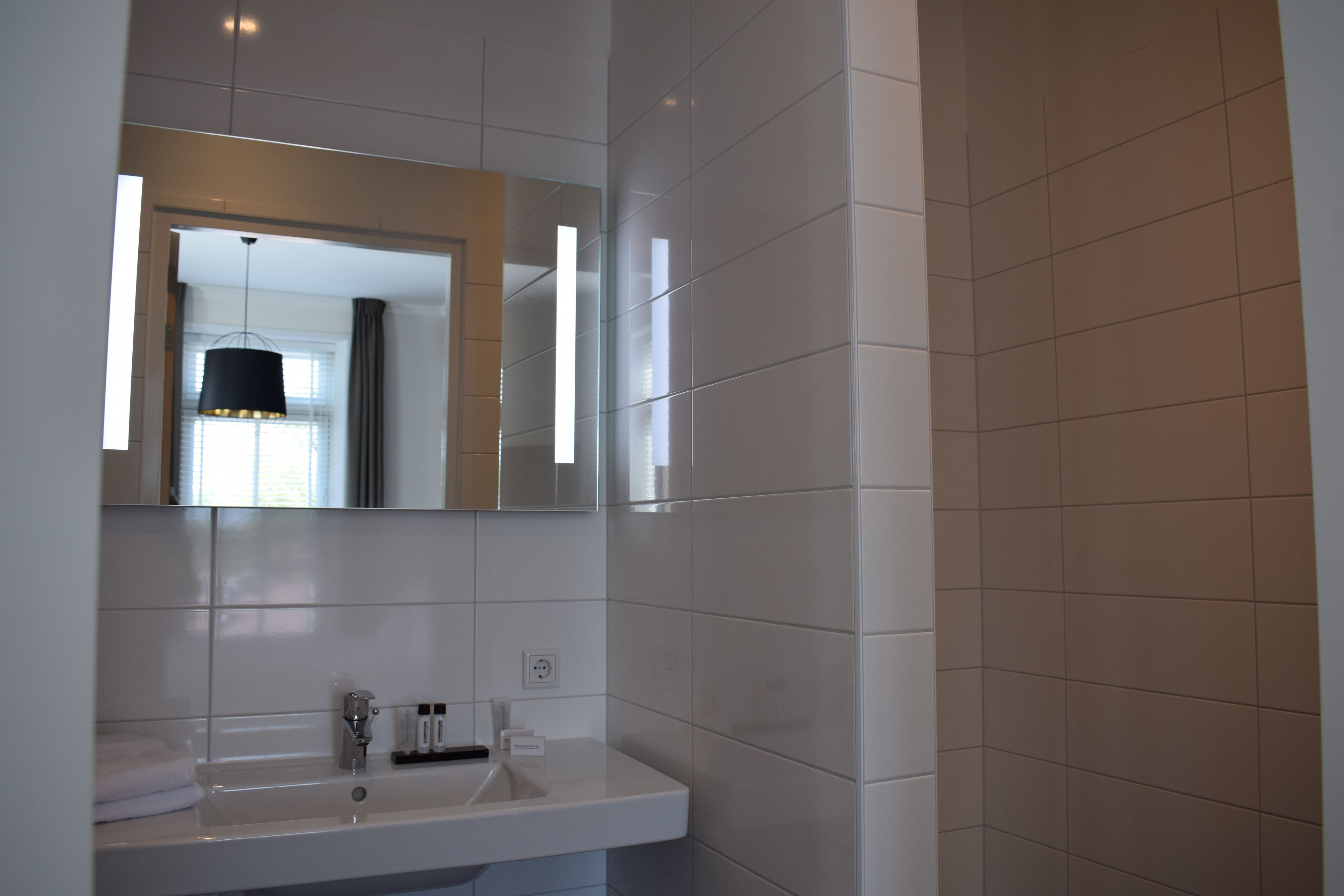 standard room | bathroom | shower, free toiletries, hair dryer, towels