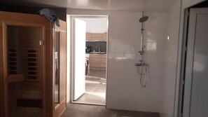 Shower, hair dryer, towels, soap
