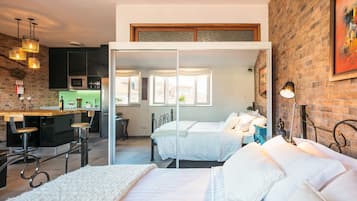 Family Apartment, 1 Bedroom, City View | 1 bedroom, in-room safe, individually decorated, individually furnished