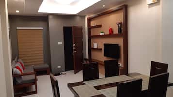 Duplex, 3 Bedrooms | Living area | Flat-screen TV