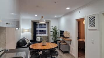 Family Apartment, 2 Bedrooms, Non Smoking, City View | Living area | 32-inch flat-screen TV with cable channels, TV