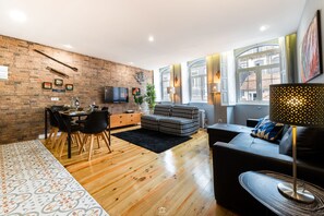 Family Apartment, 1 Bedroom, Non Smoking, City View | Living area | Flat-screen TV - Merc Porto Downtown (Porto)