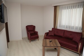 Family Suite | Living area | LCD TV - Hotel Paris Prestige (Izmir)