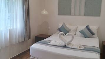 Apartment, 2 Bedrooms | 2 bedrooms, in-room safe, iron/ironing board, free cribs/infant beds