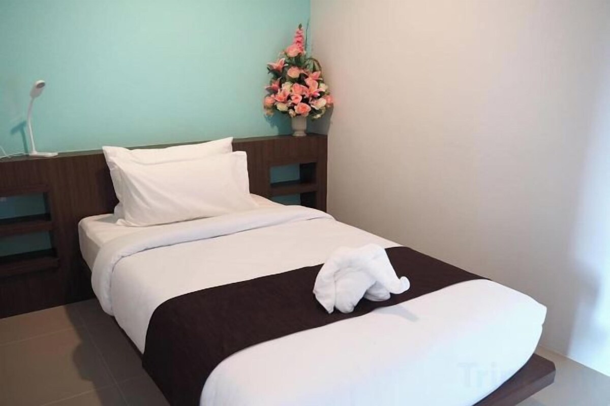 Desk, blackout drapes, rollaway beds (surcharge), WiFi (free)