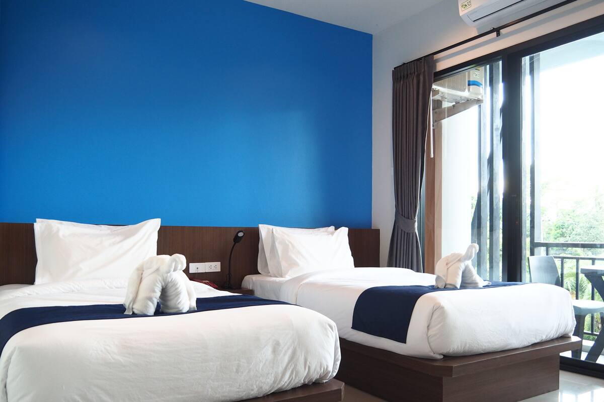 Desk, blackout drapes, rollaway beds (surcharge), WiFi (free)