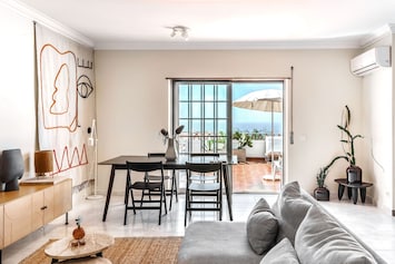 Bright living room with Ericeira view