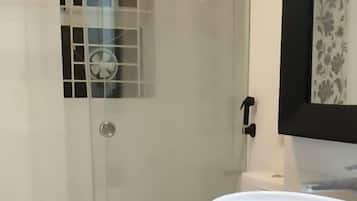 Shower, rainfall showerhead, towels