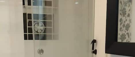 Shower, rainfall showerhead, towels