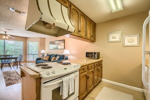 Condo, 2 Bedrooms | Private kitchen | Fridge, microwave, oven, stovetop - Totally Tubular Crc 303 2 Bedroom Condo by RedAwning (New Braunfels)