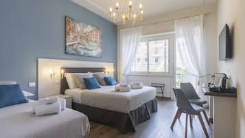 Camera Tripla con Balcone | Premium bedding, minibar, in-room safe, individually decorated