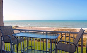 Outdoor dining - Arbomar 302 Gulf Front 2 BR by FVC (Longboat Key)
