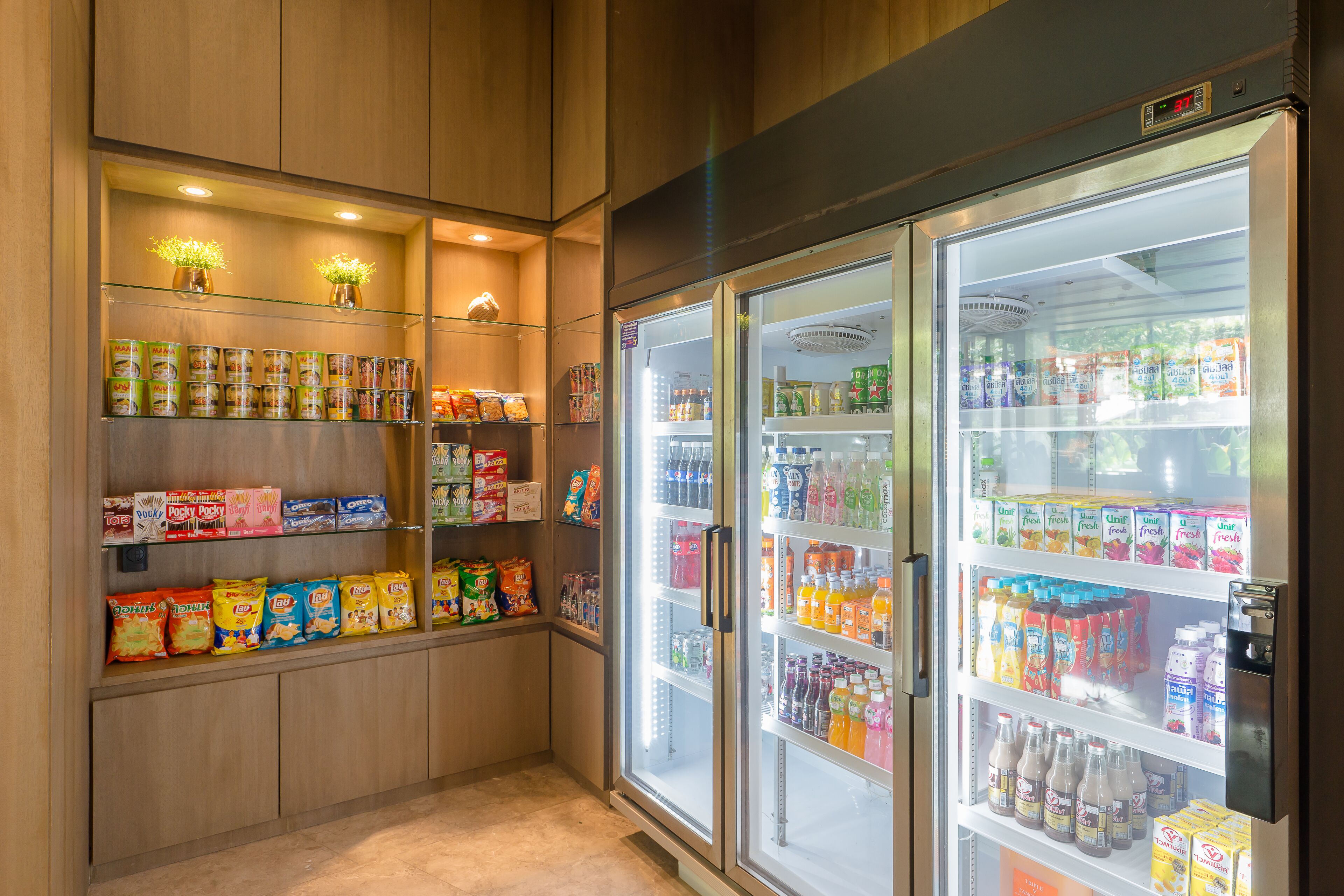 A vending machine area with snacks and beverages.