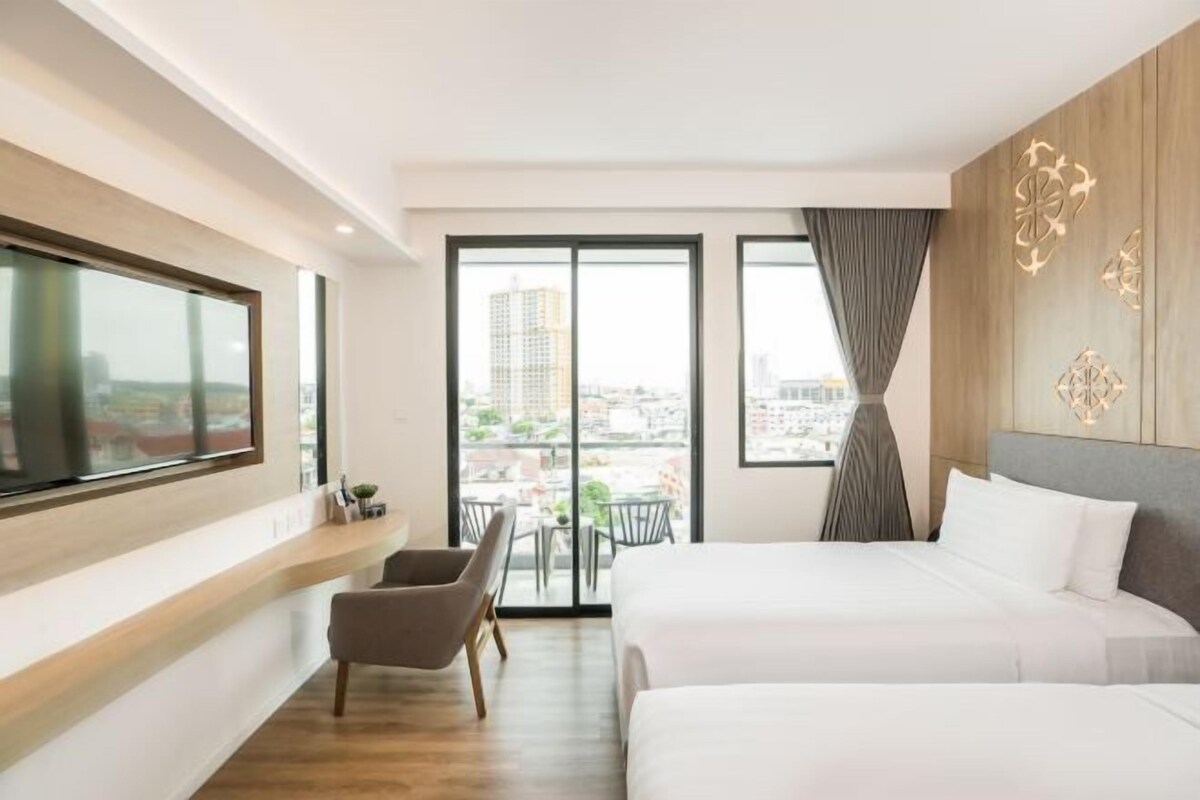 Luxe beddengoed, een kluis op de kamer, een bureau
