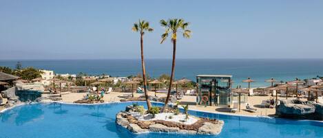 Indoor pool, 3 outdoor pools, pool umbrellas, pool loungers