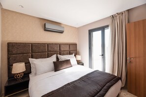 Deluxe Suite | 1 bedroom, Egyptian cotton sheets, premium bedding, minibar