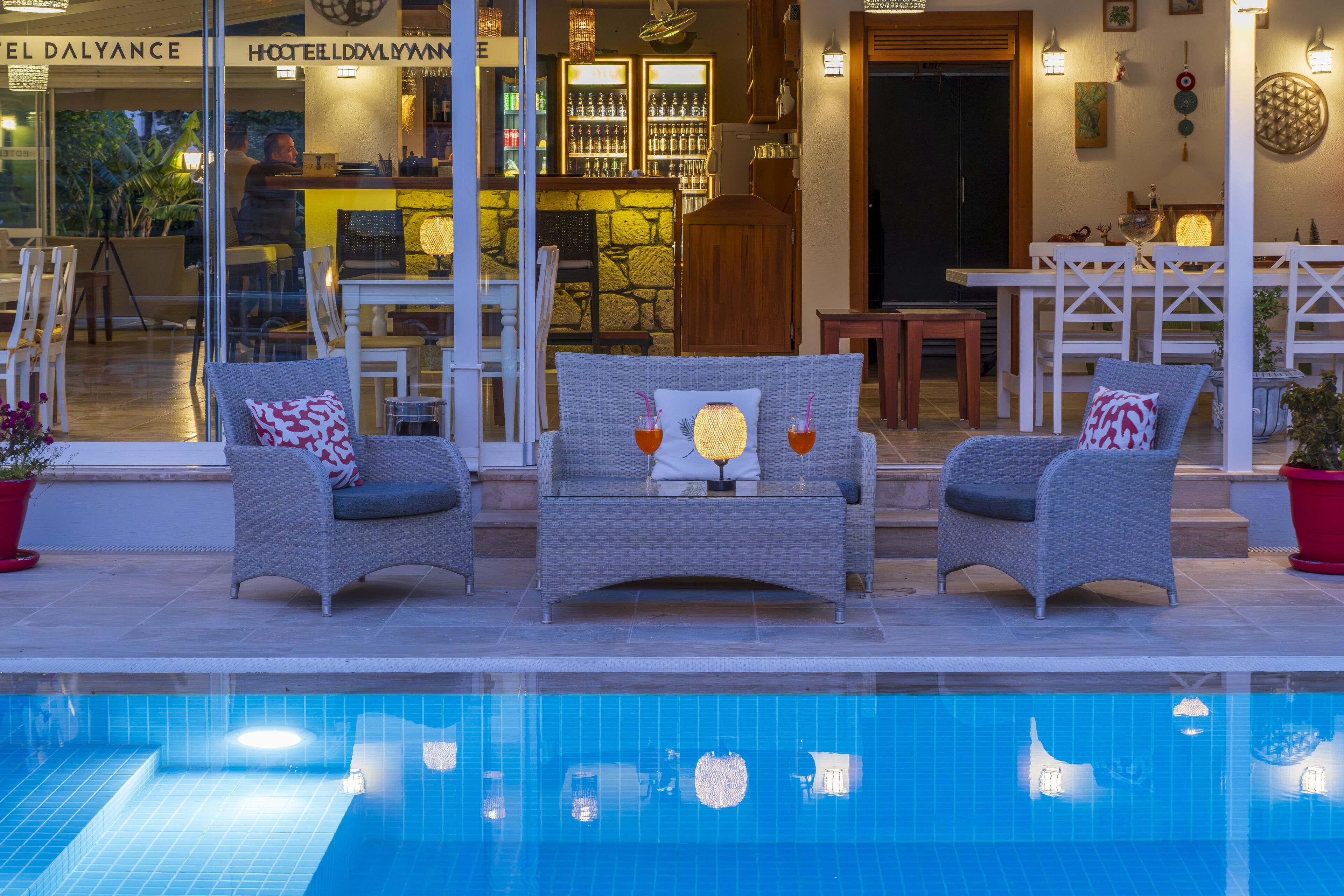 seasonal outdoor pool, open 9:00 am to 6:00 pm, pool umbrellas