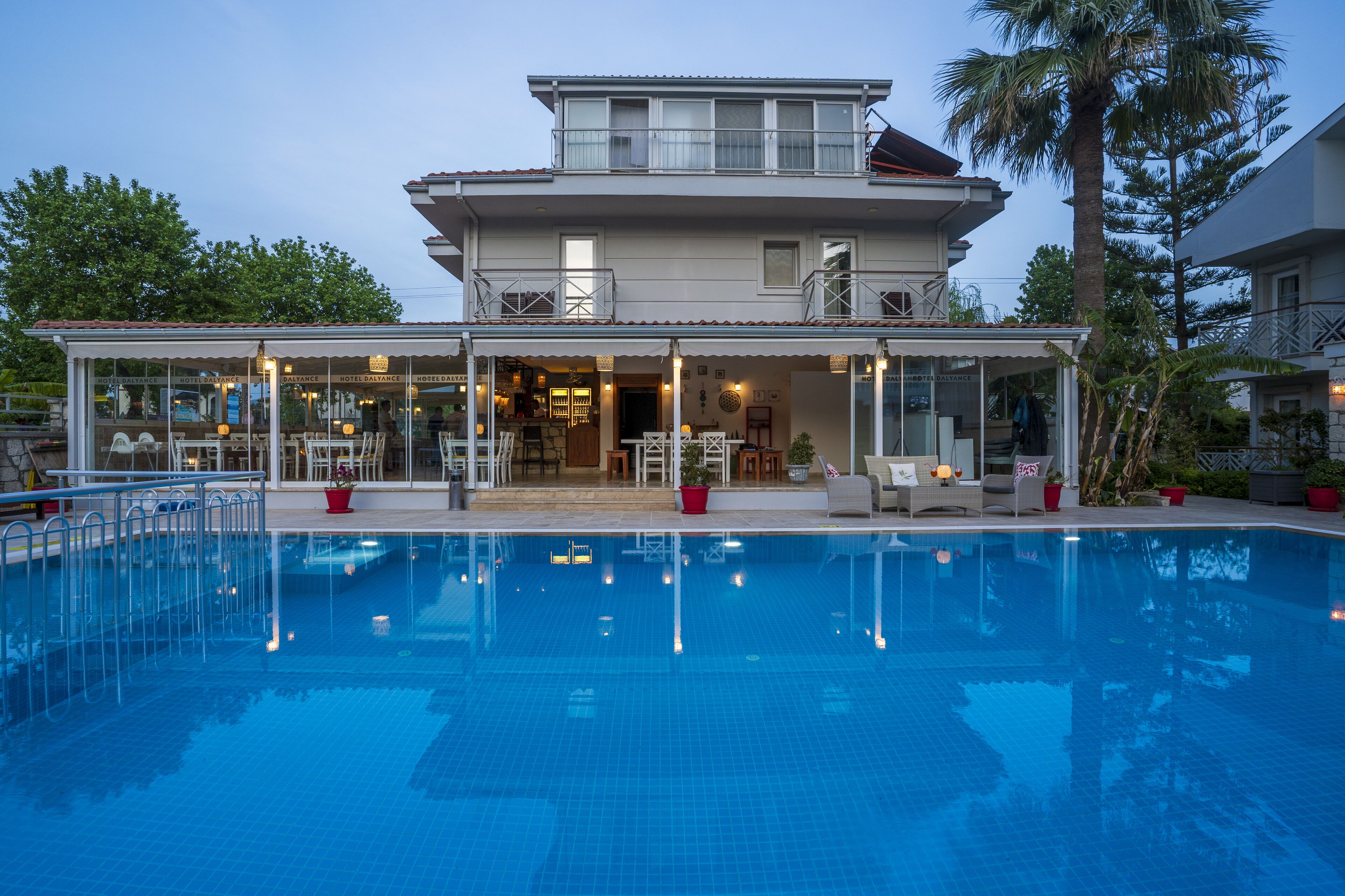 seasonal outdoor pool, open 9:00 am to 6:00 pm, pool umbrellas