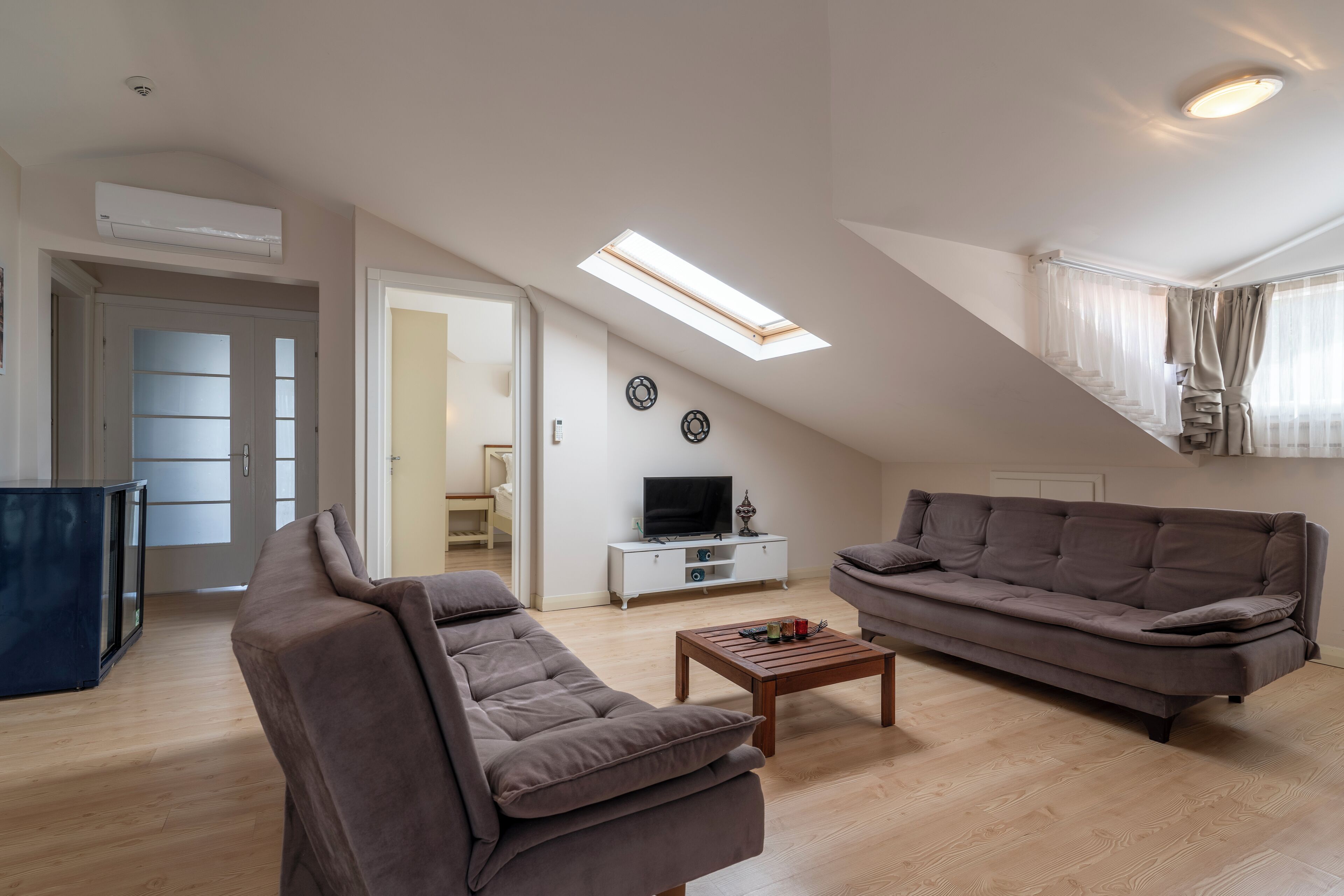 deluxe apartment | living area | lcd tv