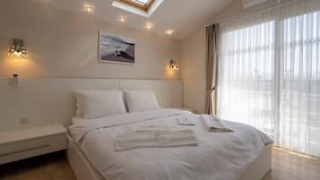 Ropa de cama de alta calidad y minibar