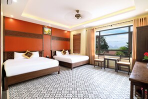 Family Room | Premium bedding, in-room safe, desk, laptop workspace