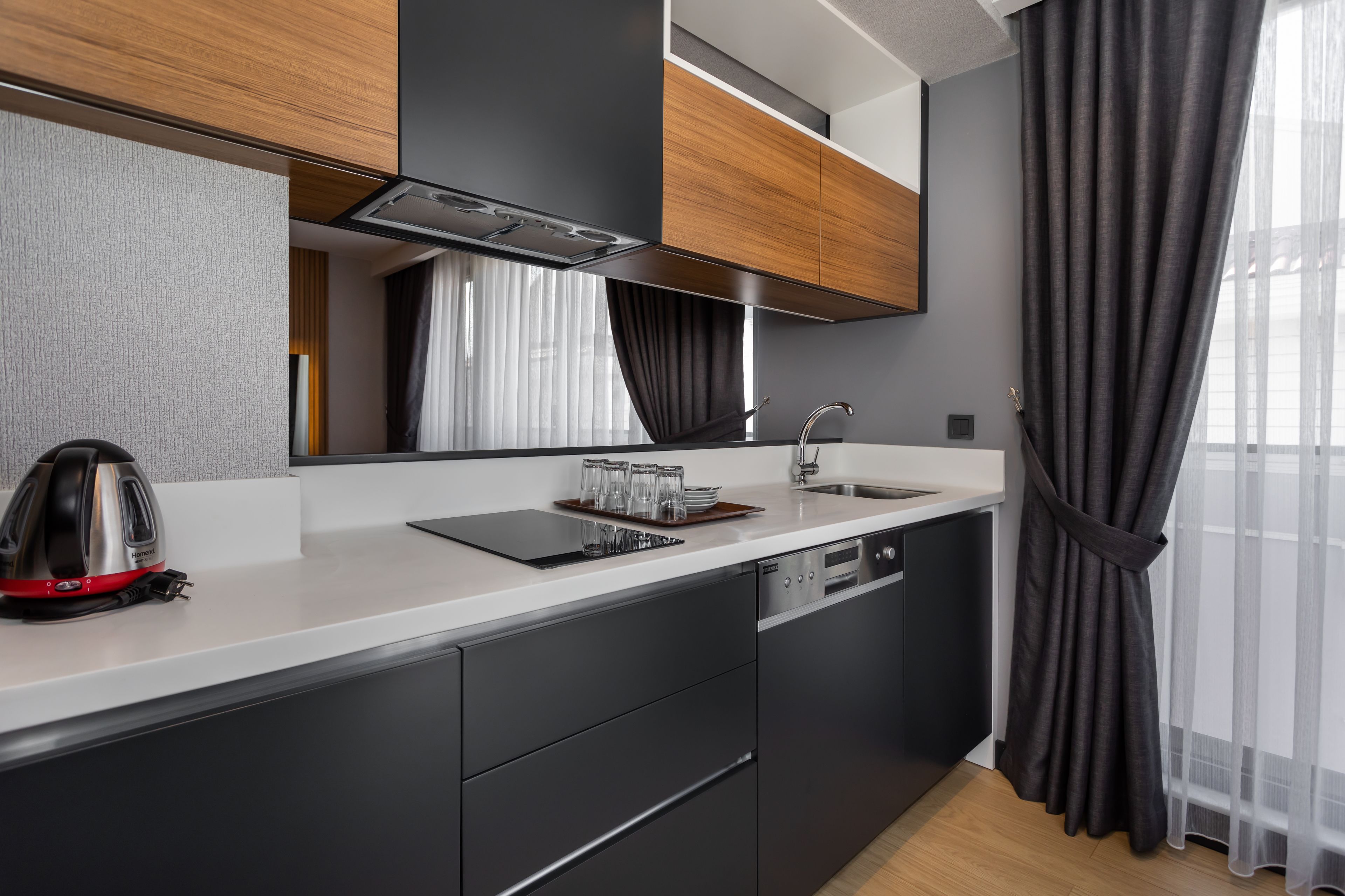 Grand Suite | Private kitchenette | Full-sized fridge, stovetop, dishwasher, electric kettle