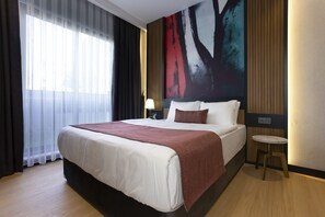 Sengetøy av topp kvalitet, safe på rommet og individuelt dekorert