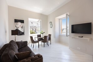 Deluxe Apartment, 2 Bedrooms, City View | Living area - Amazing Colosseo (Rome)