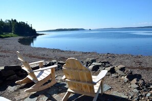Beach - Sea-Breeze Cottage perched on the edge of the bay. (Eastport)