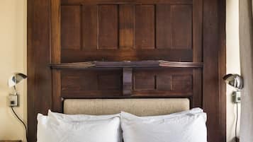 Down comforters, desk, blackout drapes, iron/ironing board