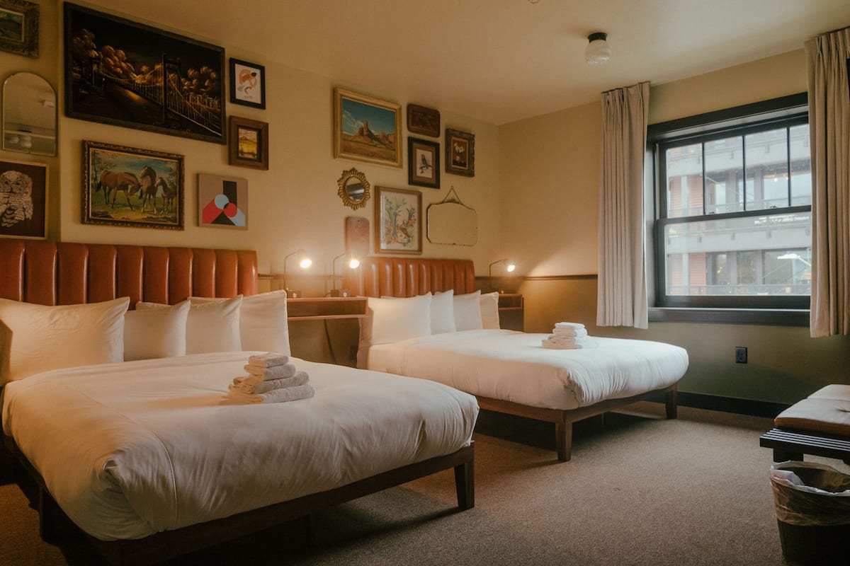 Deluxe Room, 2 Queen Beds, Shared Bathroom (Double Queen-Shared Bath) | Down comforters, desk, blackout drapes, iron/ironing board