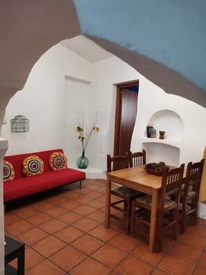 Quadruple Room, 1 Bedroom, Kitchen (La Rondeña) | Living area | Flat-screen TV - Casa Rural La Posada de María (Malpartida de Caceres)