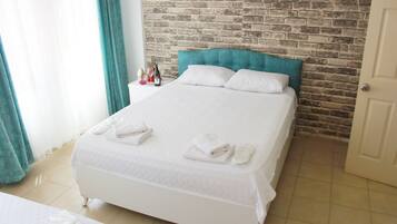 Desk, laptop workspace, free WiFi, bed sheets