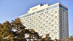 A tall, modern building with a grid-like facade and the name "WESTIN" on the top. - Vla Vla Apartments (Zagreb)