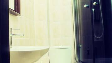 Shower, free toiletries, hair dryer, bathrobes