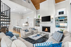 Televisio, takka, DVD-soitin, videokirjasto